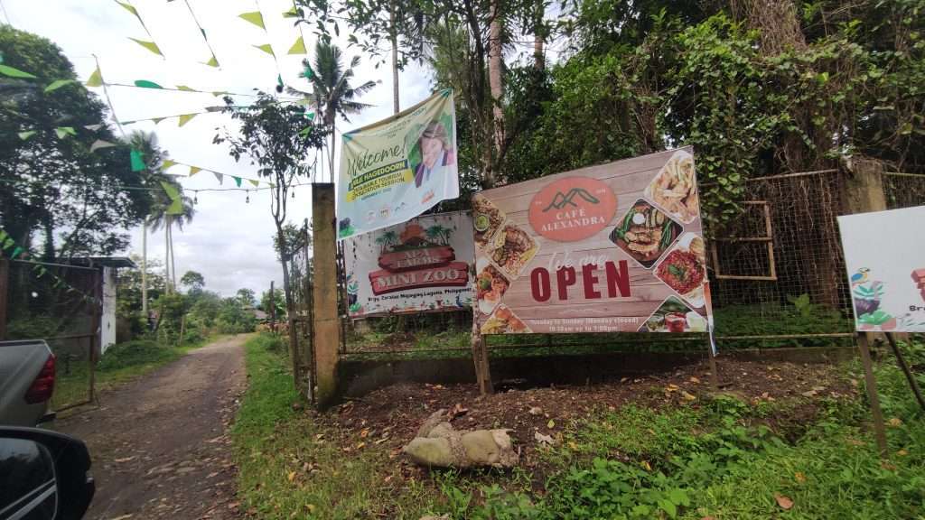 Tarp in front of the entrance to Cafe Alexandra and APA Farms
