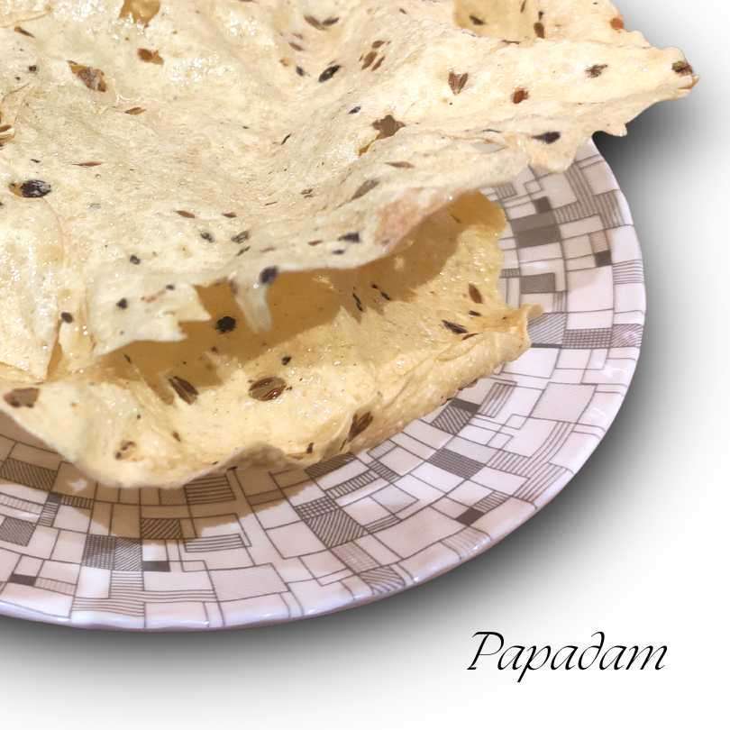 Papadom | Vraja Cuisine 18 Papadam or papadom from Vraja Cuisine